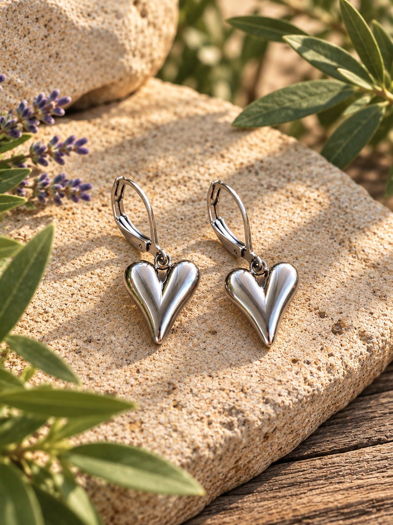SILVER SCULPTED HEART EARRINGS