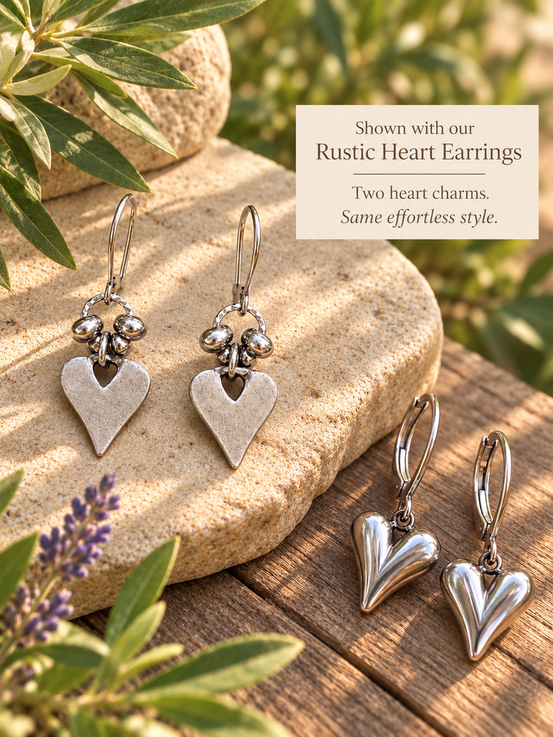 SILVER SCULPTED HEART EARRINGS